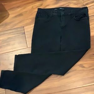 Black skinny jeans with stretch.